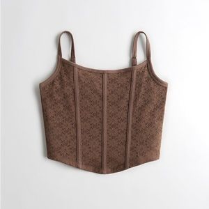 small, corset looking tank crop top, kinda floral like! 🌼🤎